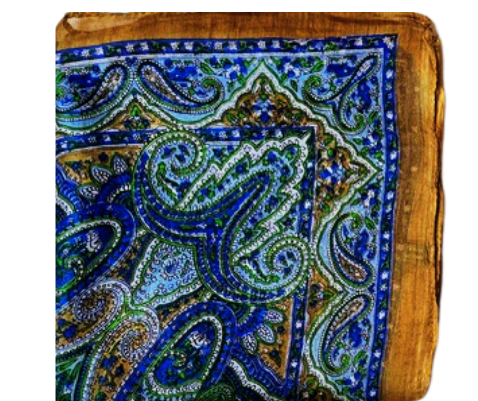 Hand-hemmed lightweight silk scarf with blue and green paisley pattern and gold border, sustainable artisan craft
